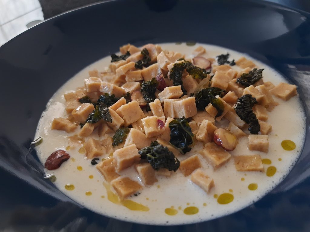 Pasta Reale con Rapa su Fonduta di Fossa, Cavolo Nero e Nocciole
